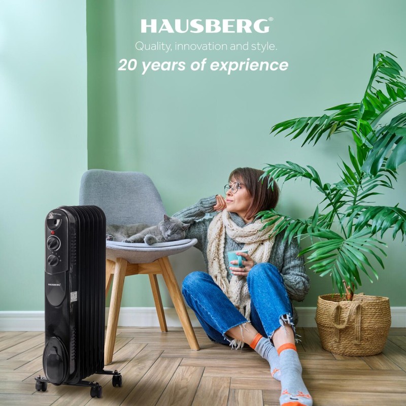 Calorifer electric cu ulei HAUSBERG HB-8905, 3 trepte, 600-900-1500 W, 7 elementi 110 mm x 580 mm, termostat reglabil, maner si rotite pentru o deplasare facila, indicator luminos functionare, negru